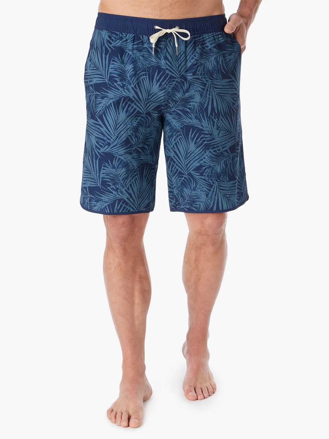 Person wearing grey and navy floral patterned Anchor Trunk in 10 inch on a white background