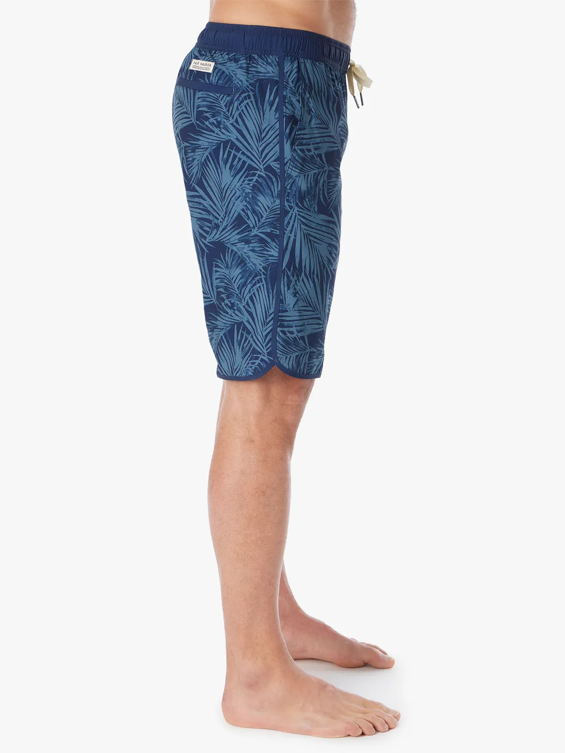 Person wearing grey and navy floral  patterned Anchor Trunk in 10 inch inseam, showing side view on a white background