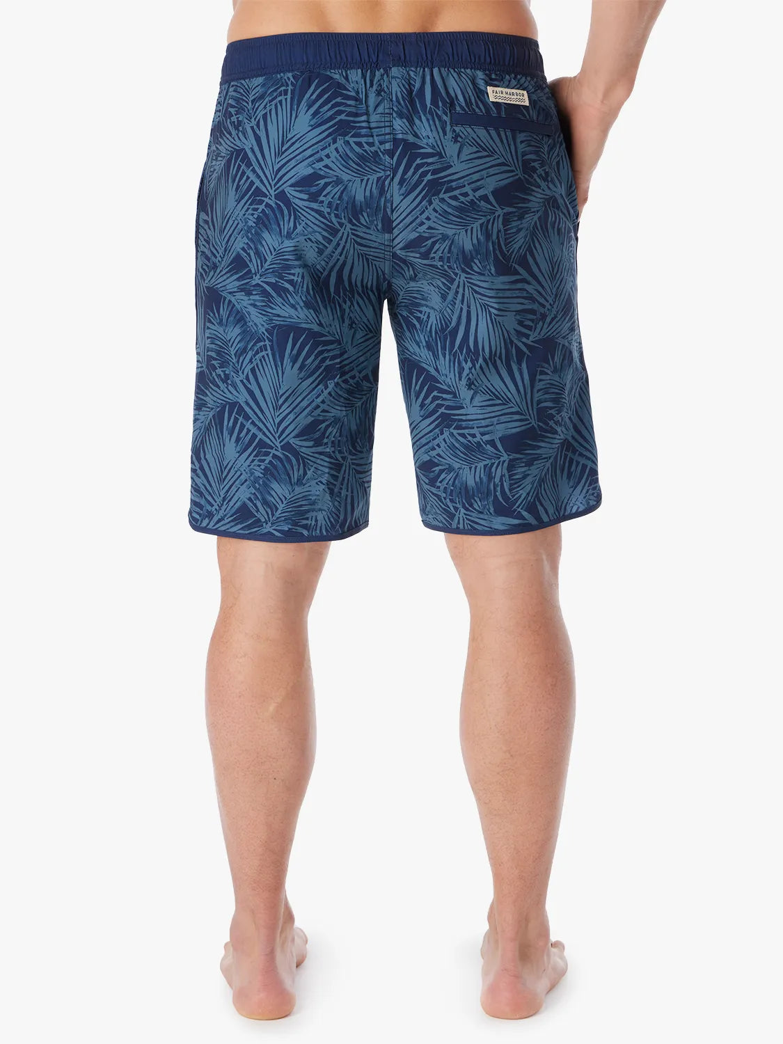 Person wearing grey and navy floral  patterned Anchor Trunk in 10 inch inseam, showing back view on a white background