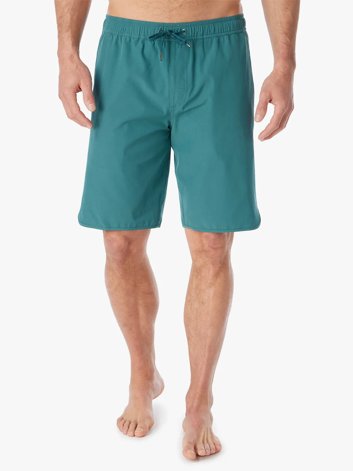 Person wearing 10 inch anchor trunks in seapine color on a white background.