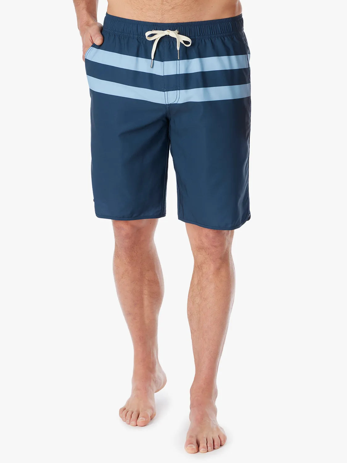 A person wearing a pair of 10 inch navy anchor trunk shorts with two light blue horizontal stripes and a drawstring waist with a white background.