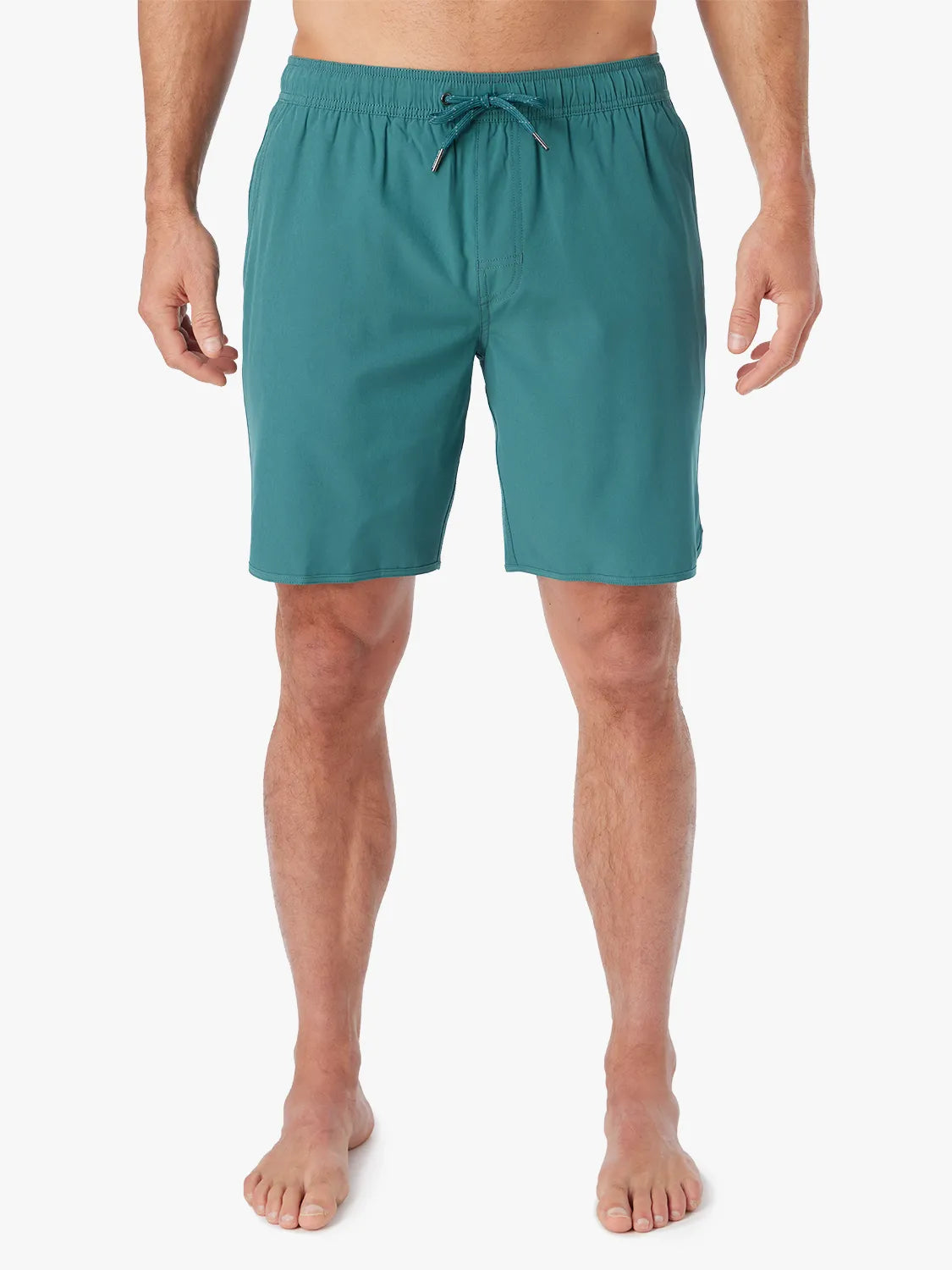 Person wearing 8 inch anchor trunks in seapine color on a white background.