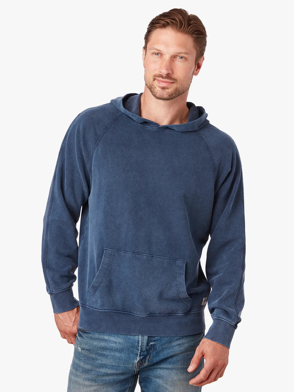 Person wearing navy blue saltaire hoodie on a white background.
