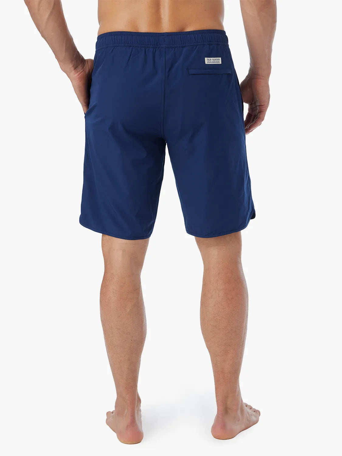 Person wearing Navy-colored Anchor Trunk in 10 inch inseam with a drawstring waist and showing the back view, displayed against a white background.