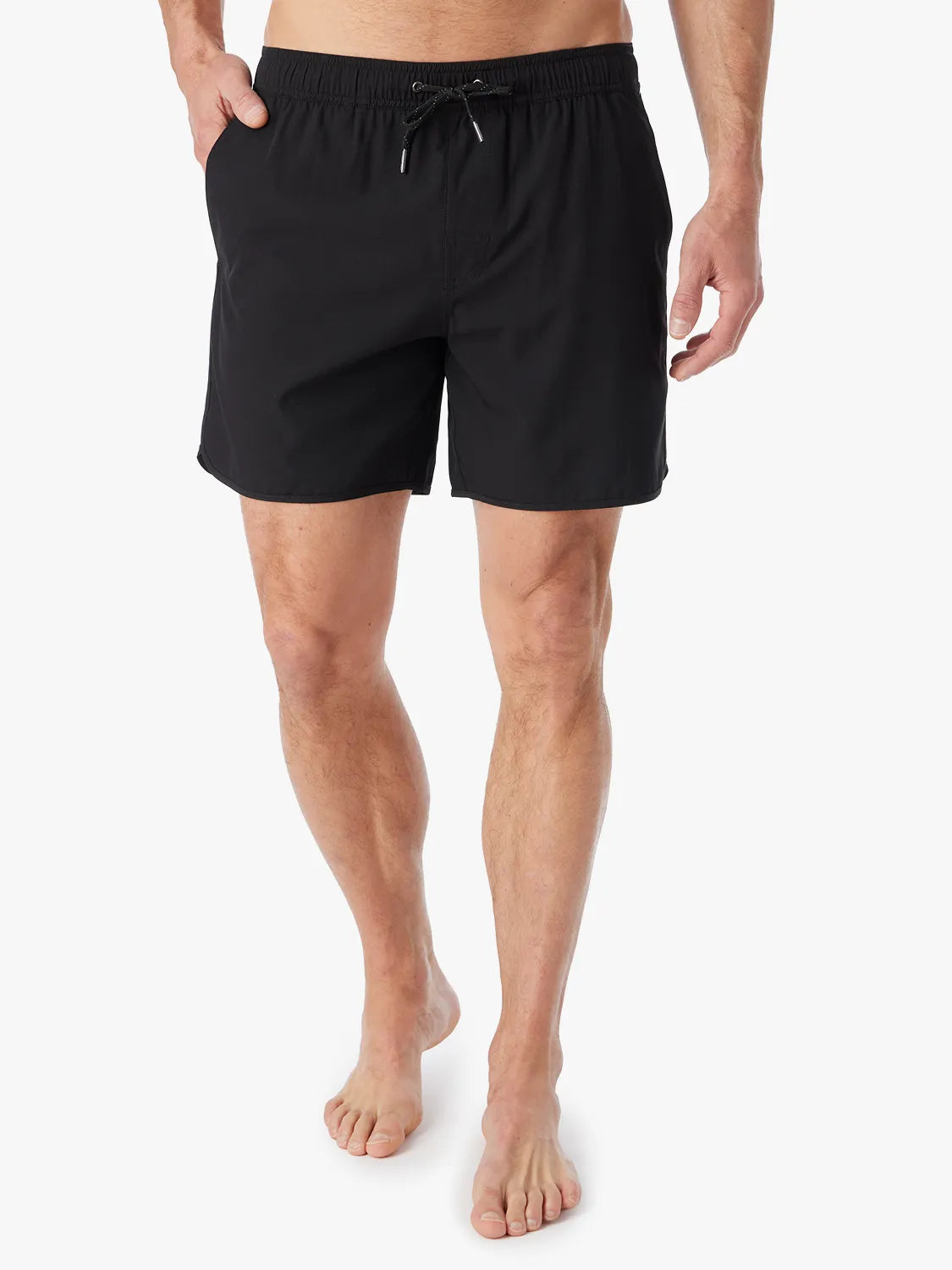 A person wearing a pair of black 6 inch Anchor Trunks on a white background