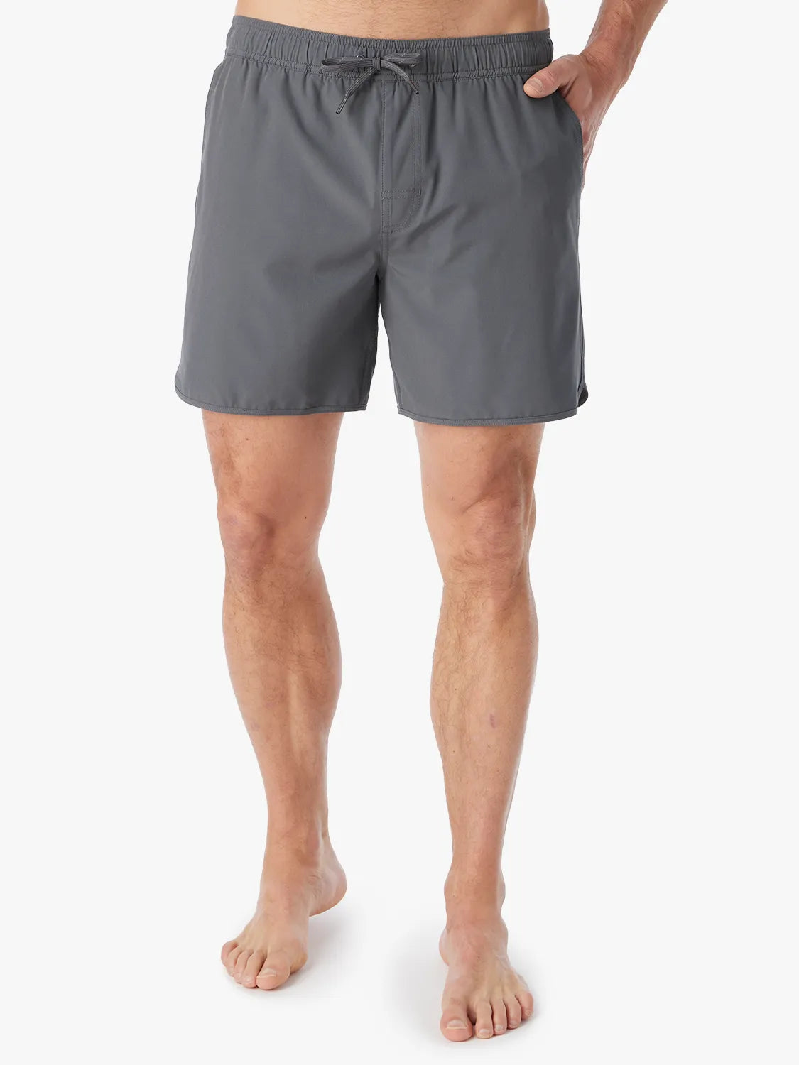 Person wearing slate grey Anchor Trunk in 6 inch inseam with hand in pocket on a white background. 