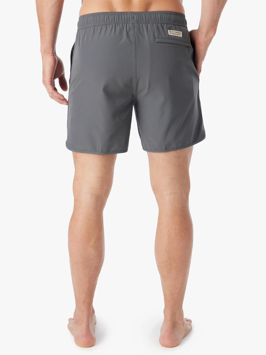 Person wearing slate grey Anchor Trunk in 6 inch inseam, showing the back view on a white background. 