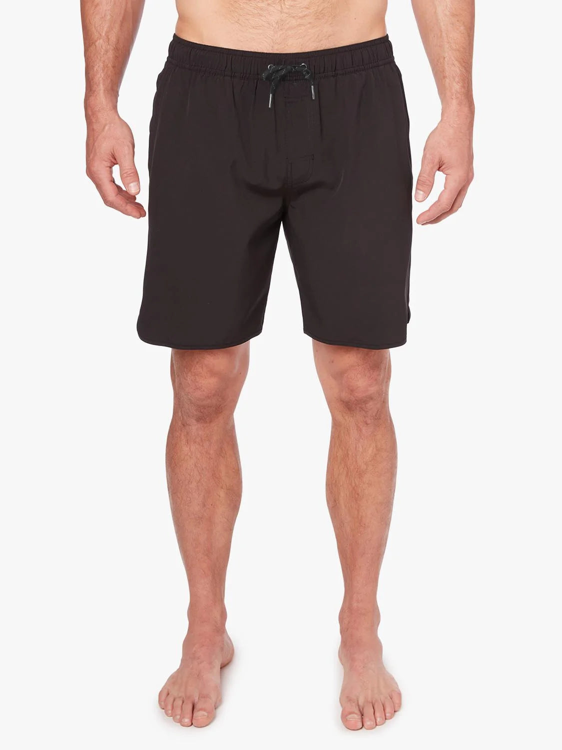 A person wearing a pair of black 8 inch Anchor Trunks on a white background