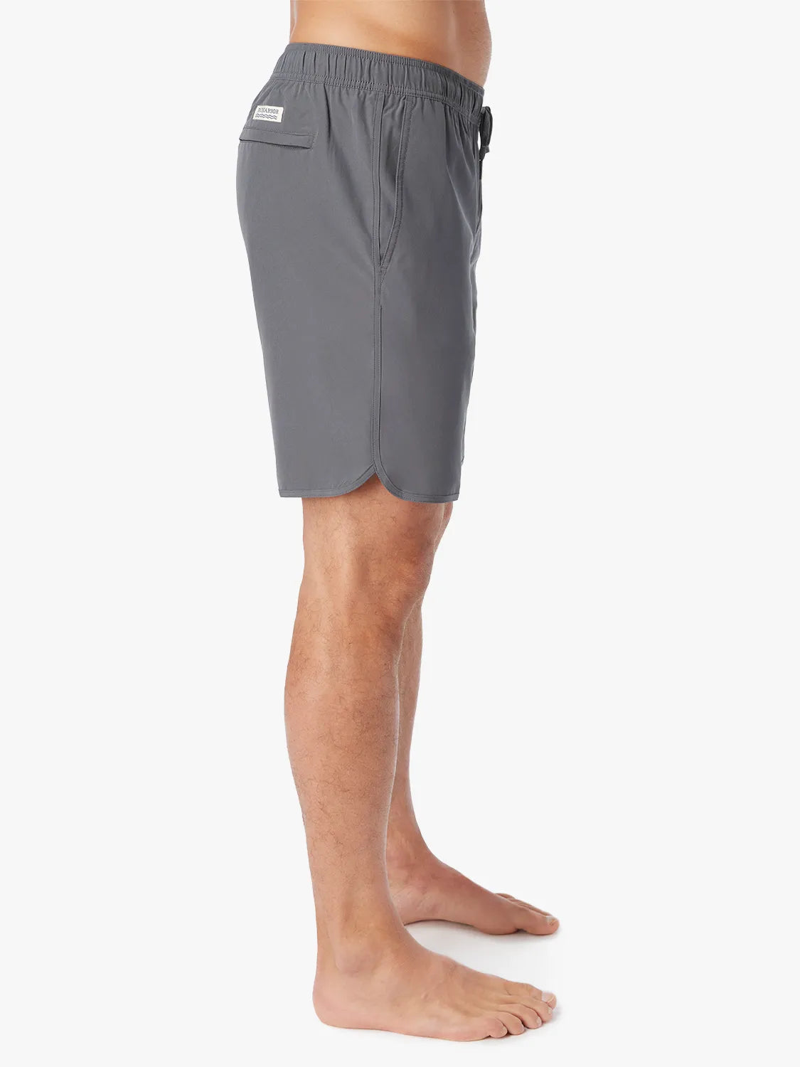 Person wearing slate grey Anchor Trunk in a 8 inch inseam, showing the side view o n a white background. 