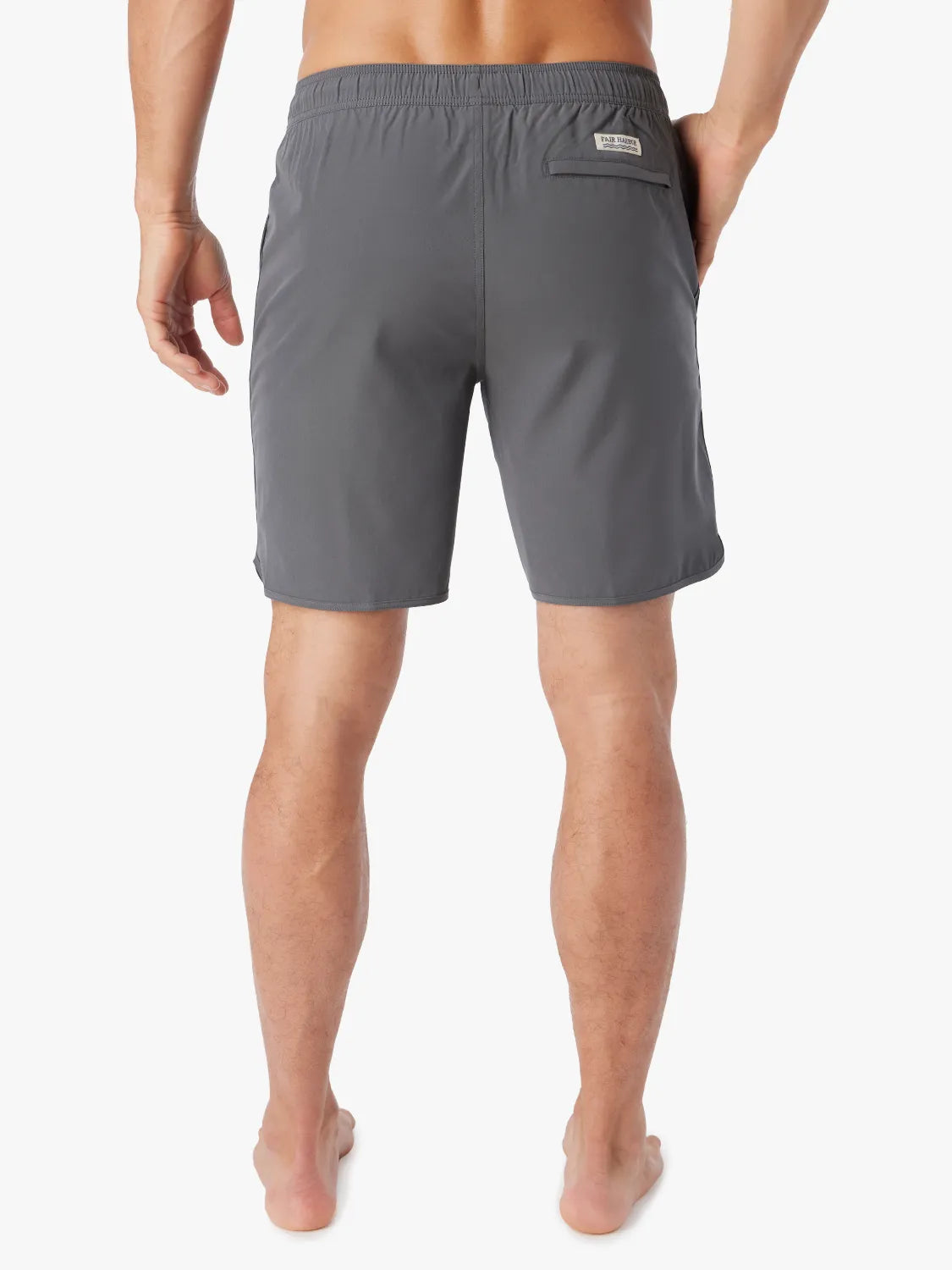 Person wearing slate grey Anchor Trunk in a 8 inch inseam, showing the back view on a white background. 