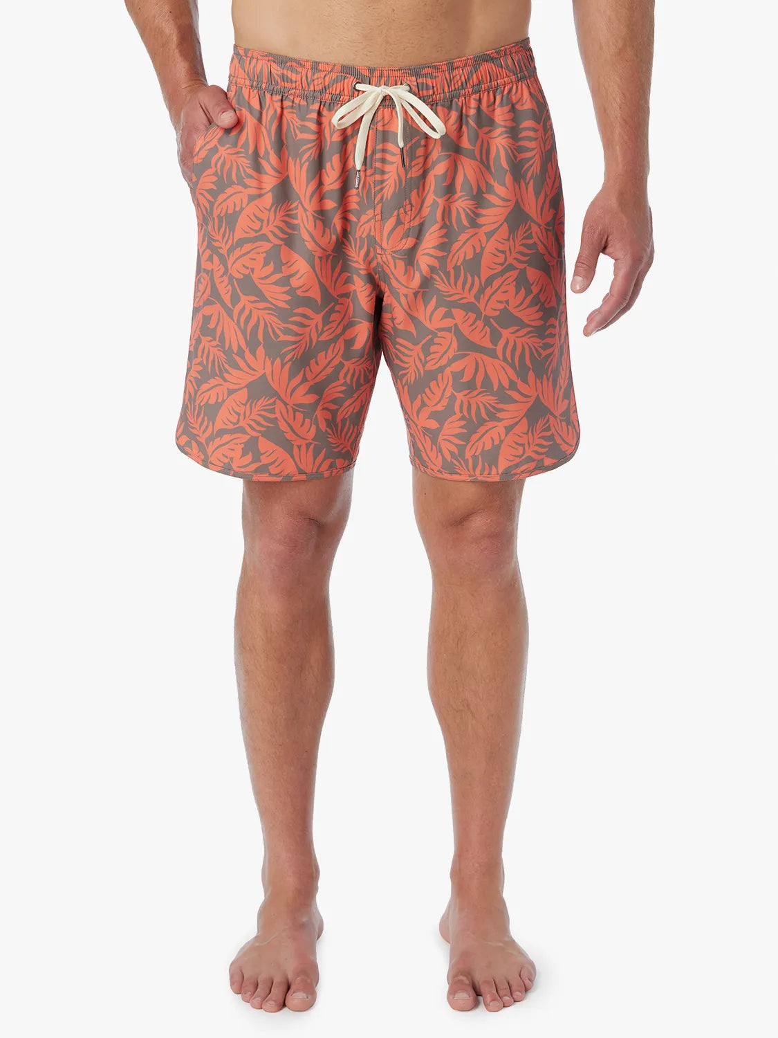 Person wearing orange and brown tropical leaf patterned Anchor Trunk  on a white background