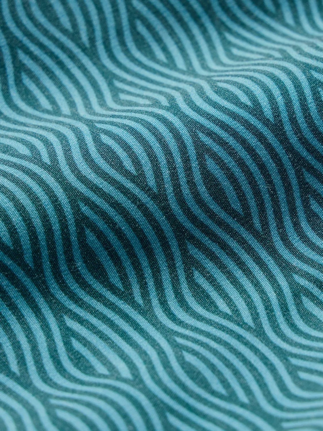 Swatch of green waves fabric 