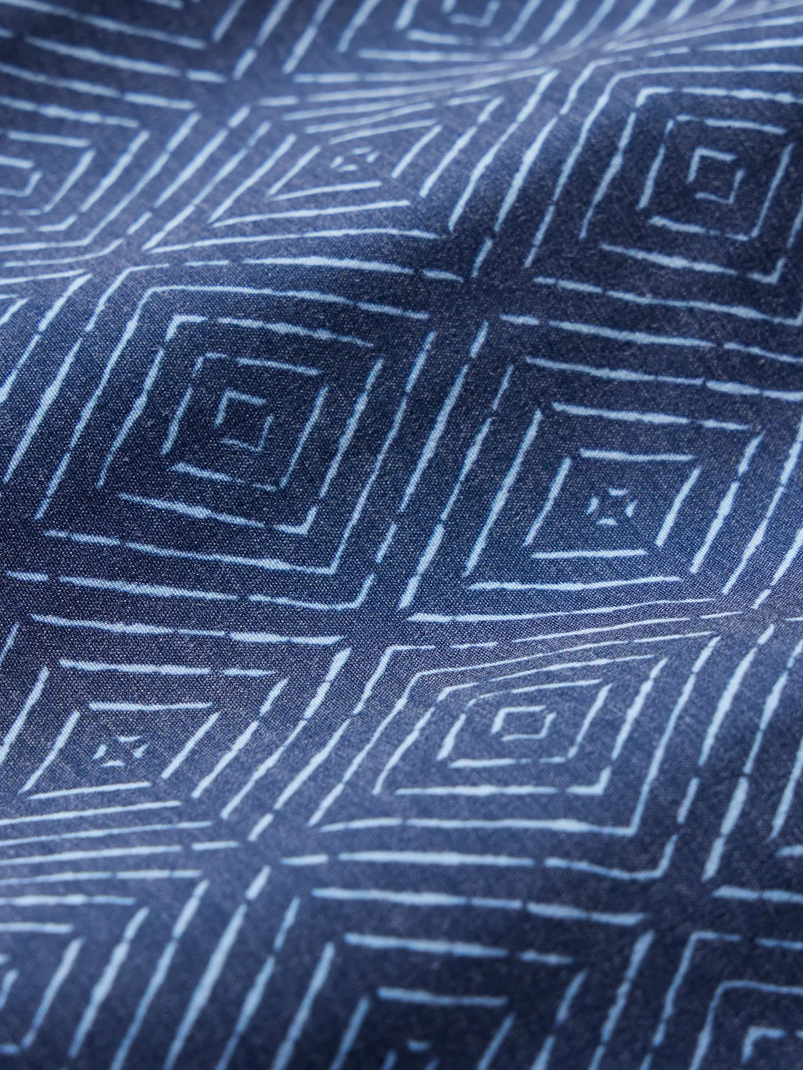 Swatch of the Person wearing Blue diamond patterned Bayberry Trunk material
