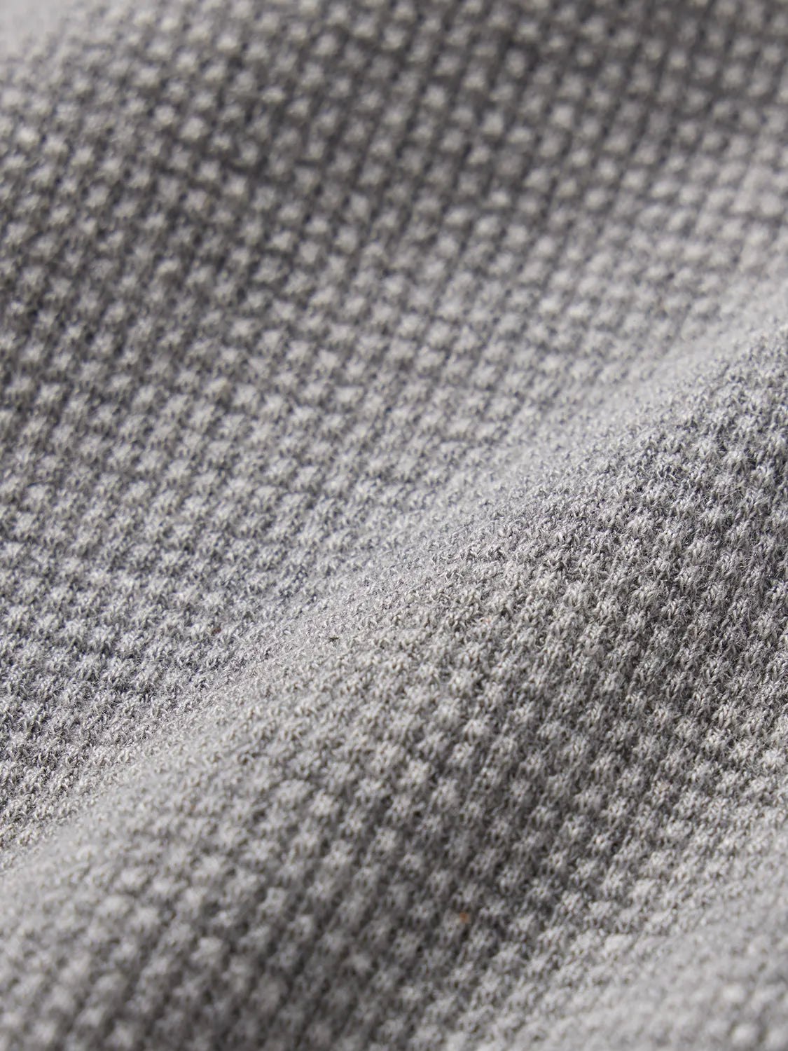Close up of grey waffle fabric