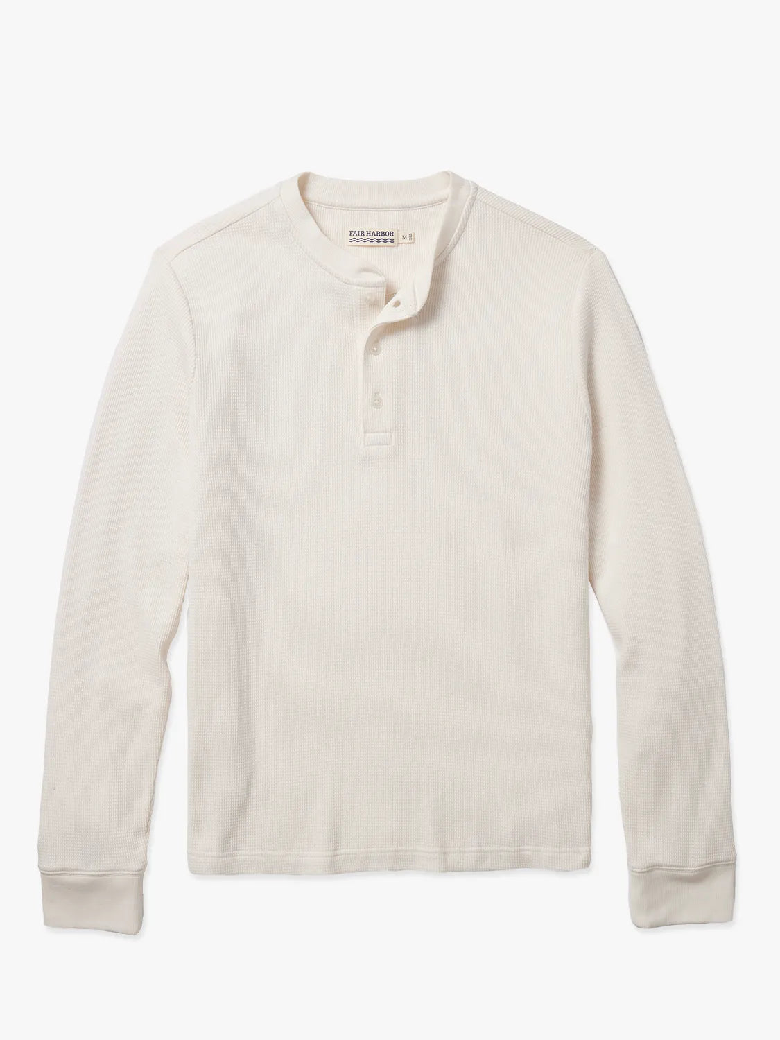 Cream long-sleeve henley waffle fabric shirt on a white background