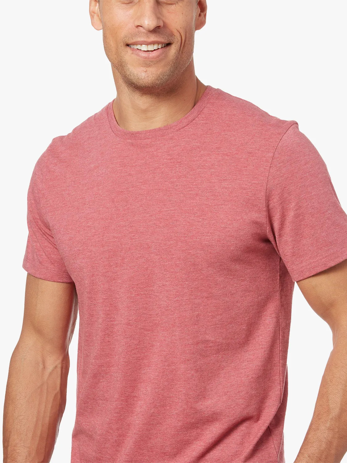 Person wearing red kismet t-shirt on a white background. 