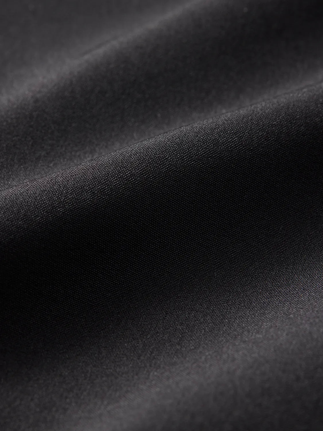 Swatch of black ozone fabric. 