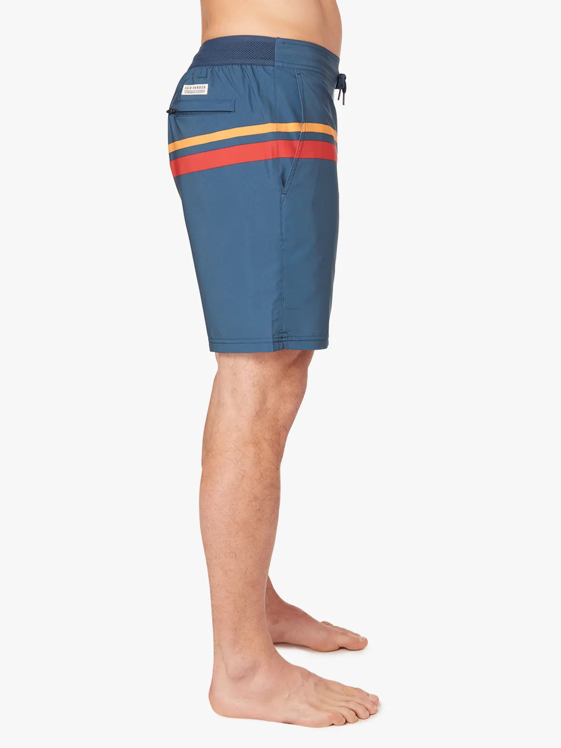 Person wearing a pair of ozone blue board shorts with red and yellow stripes on the upper part and a drawstring at the waist on a white background. Showing the side view. 