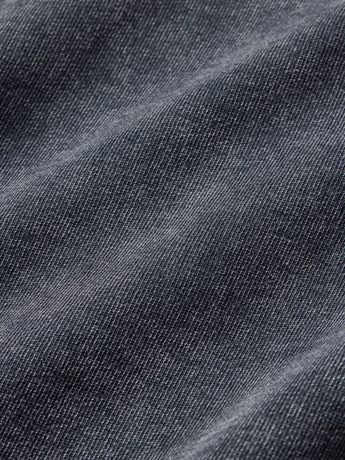 Close-up of black saltaire fabric. 