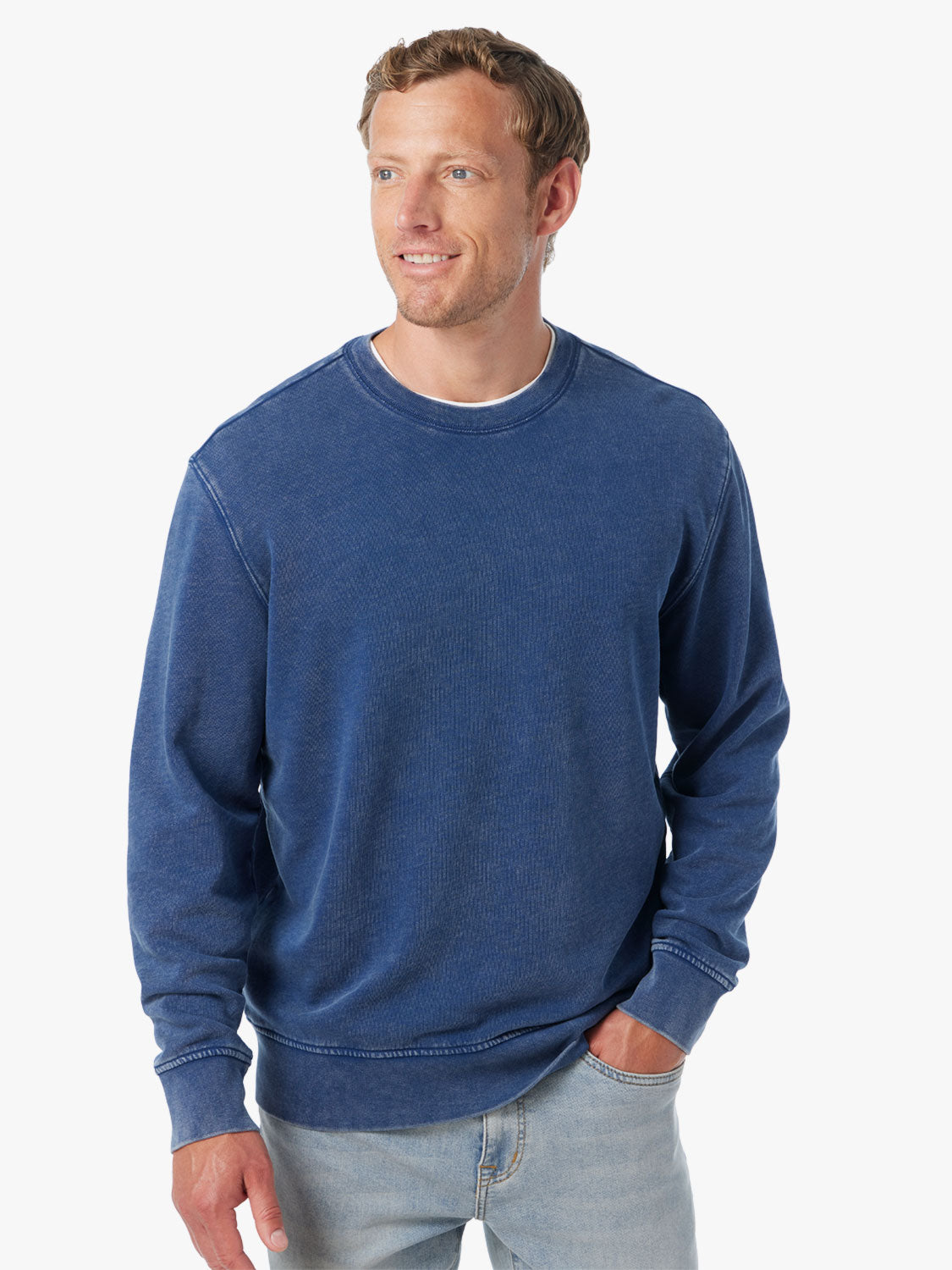 Person wearing navy blue saltaire sweatshirt on a white background