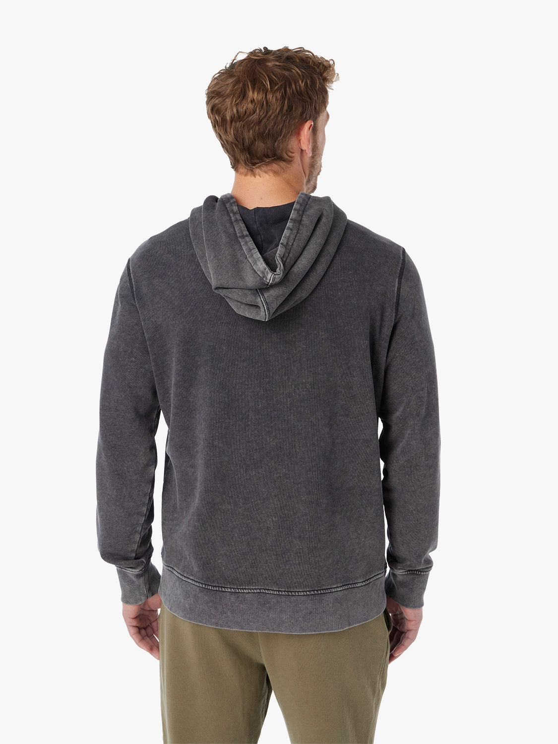 Person wearing black saltaire hoodie from behind on a white background