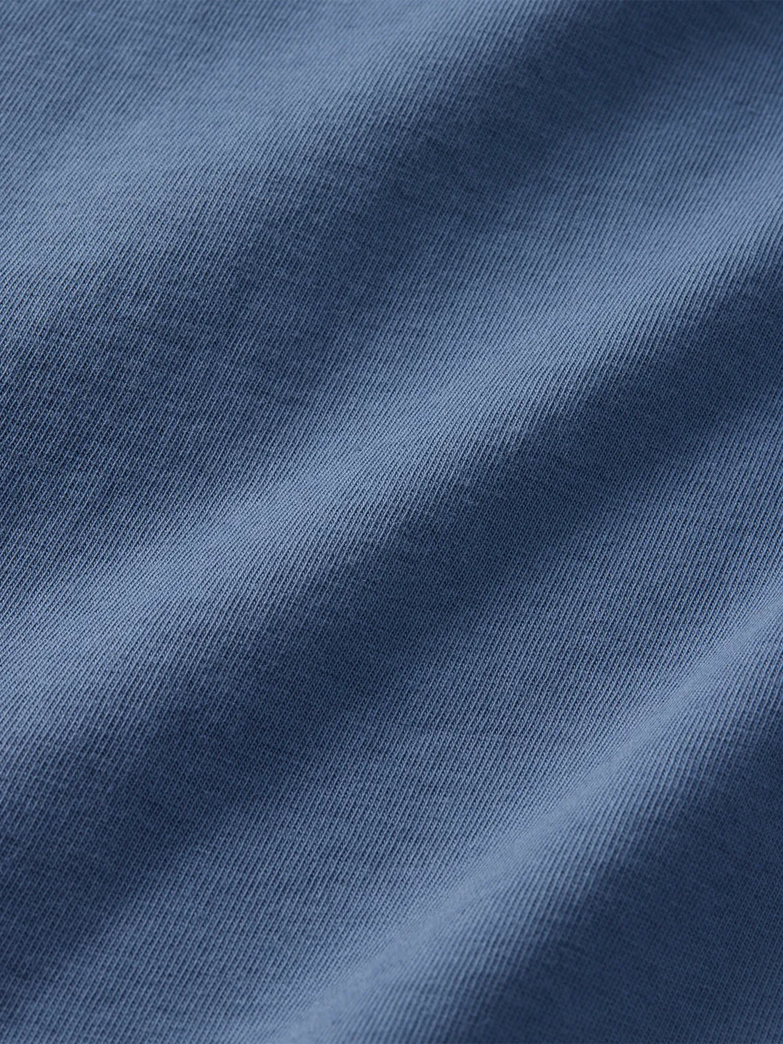 Close-up of Saltaire blue fabric swatch displaying texture